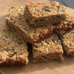 A pile of flapjacks with seeds in