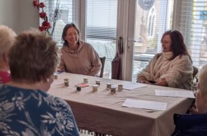 A kitchen workshop, gathered round the table